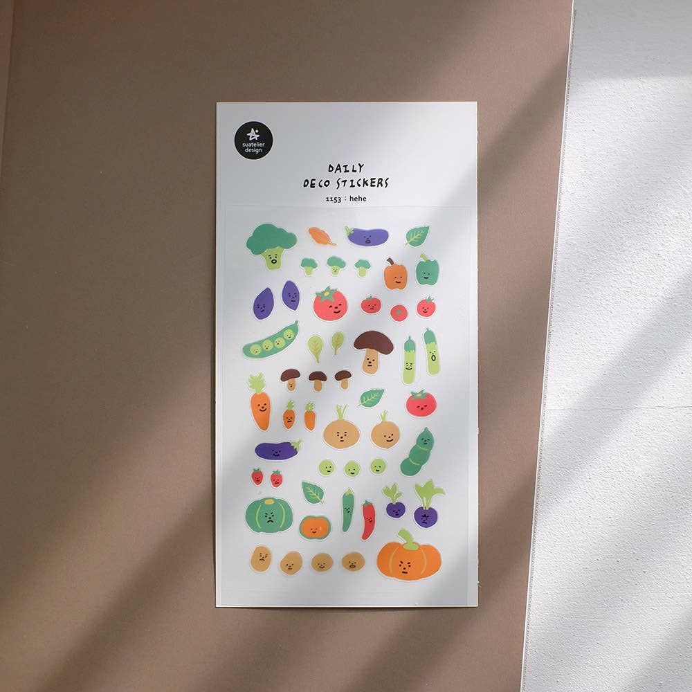 Sheet of colorful vegetable stickers on a white background