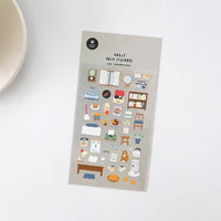 Sheet of decorative stickers with various illustrations on a white surface