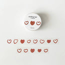 Masking tape with heart designs on a white background