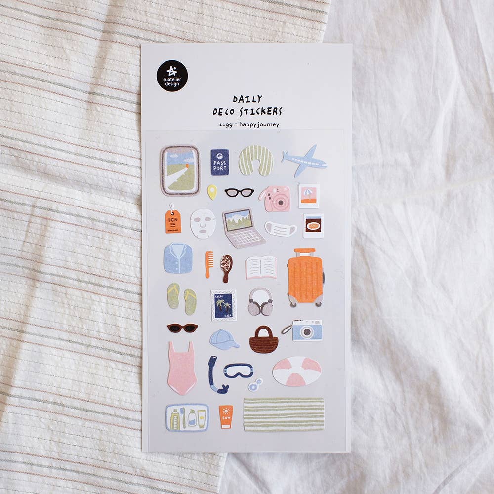 Pack of decorative stickers with various icons on a textured surface