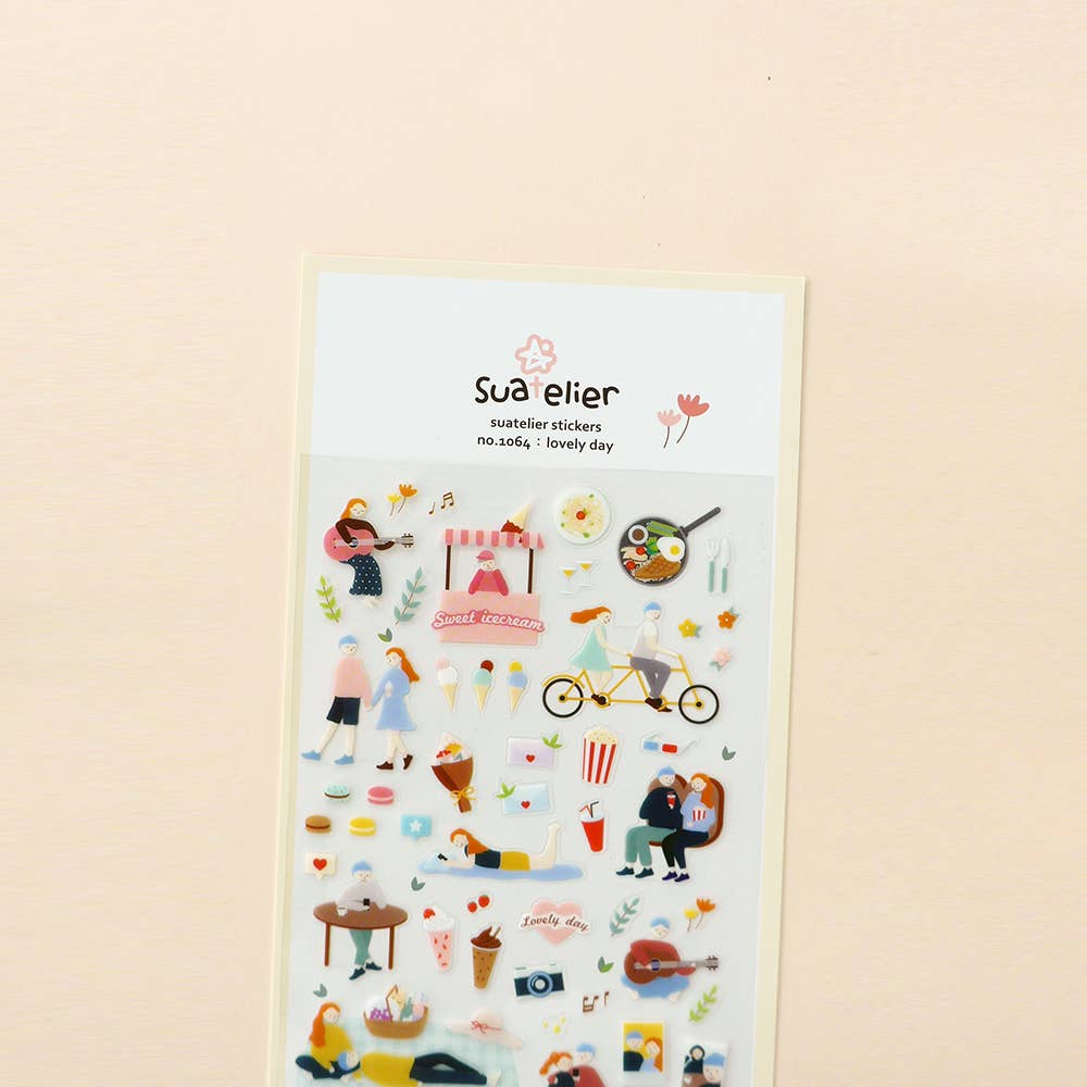 Sheet of decorative stickers with illustrations on a light blue background