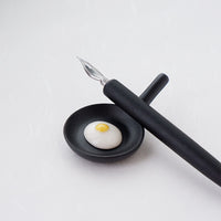 Fried egg skillet ceramic chopstick rest with a dip pen