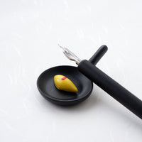 Omurice skillet ceramic chopstick rest with a dip pen
