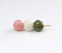Sanshoku dango ceramic chopstick rest, front view