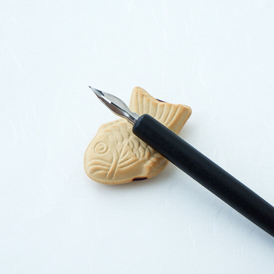 Taiyaki ceramic chopstick rest with a dip pen